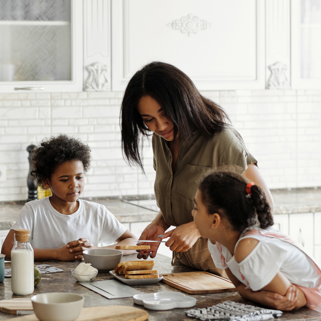 Happy family having breakfast